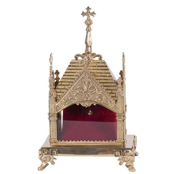 Traditional polished brass relic shrine with clear glass on all four sides. Ornate shrine with ornamental details. For relic display