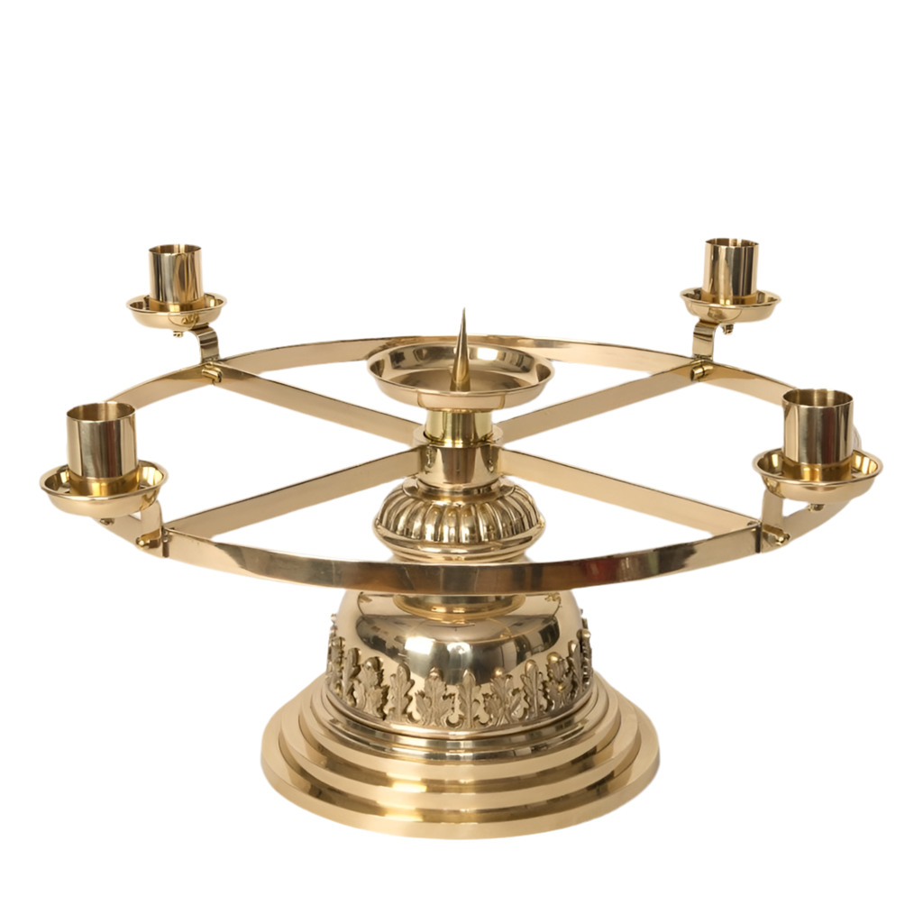 brass advent wreath on ornate rounded base. polished brass and lacquered