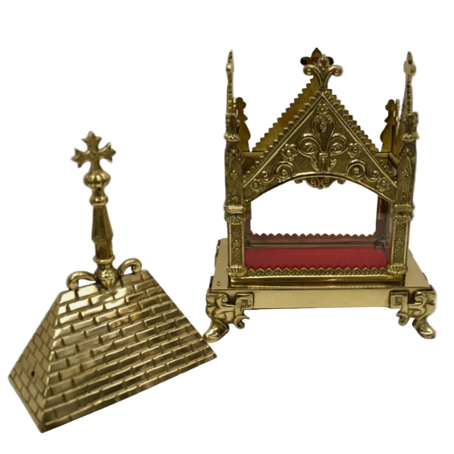 Traditional polished brass relic shrine with clear glass on all four sides. Ornate shrine with ornamental details. For relic display