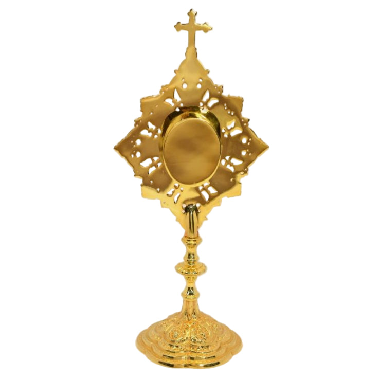 Ornate filigree reliquary in a polished brass and lacquered finish. Glass on the front and a removable door to house your relic.
BACK VIEW
