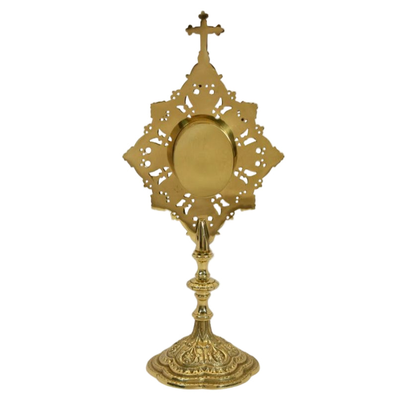 Ornate filigree reliquary in a polished brass and lacquered finish. Glass on the front and a removable door to house your relic.
BACK VIEW