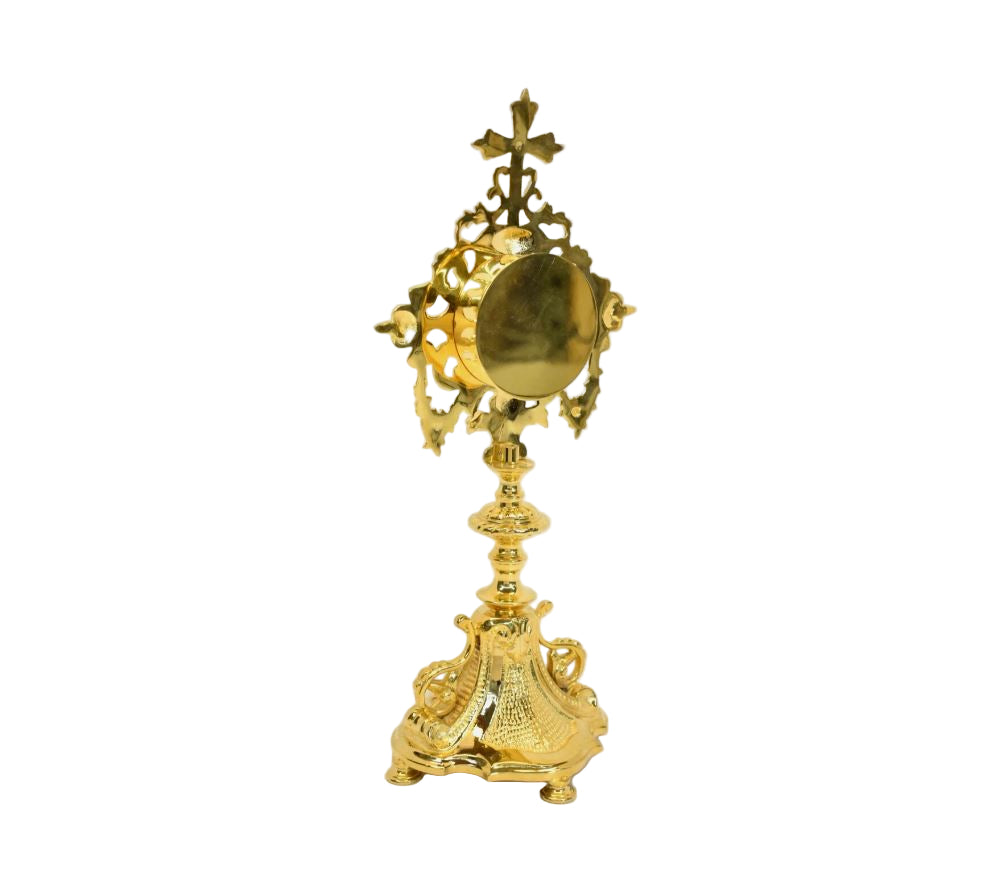 Gold plated french baroque style reliquary with glass on the front and a removable back door to house your relic.