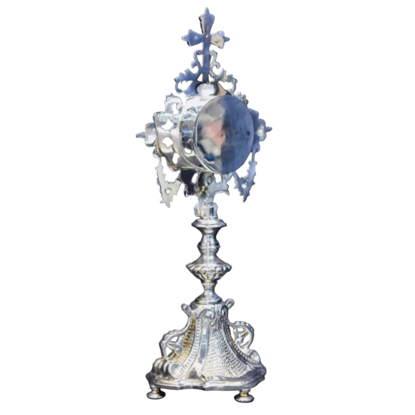 Silver plated french baroque style reliquary. Glass on front and removable glass door to house your relic.