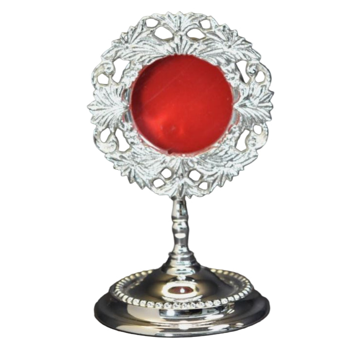Small silver plated reliquary with round glass opening and removable back door to display your relic