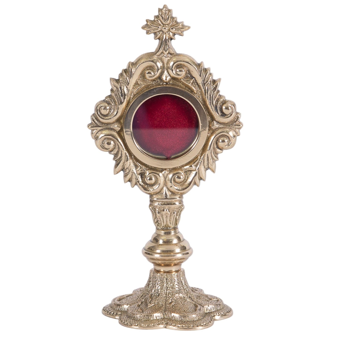 A polished brass and lacquered French style reliquary with a round front glass view and a relic compartment. Removable back