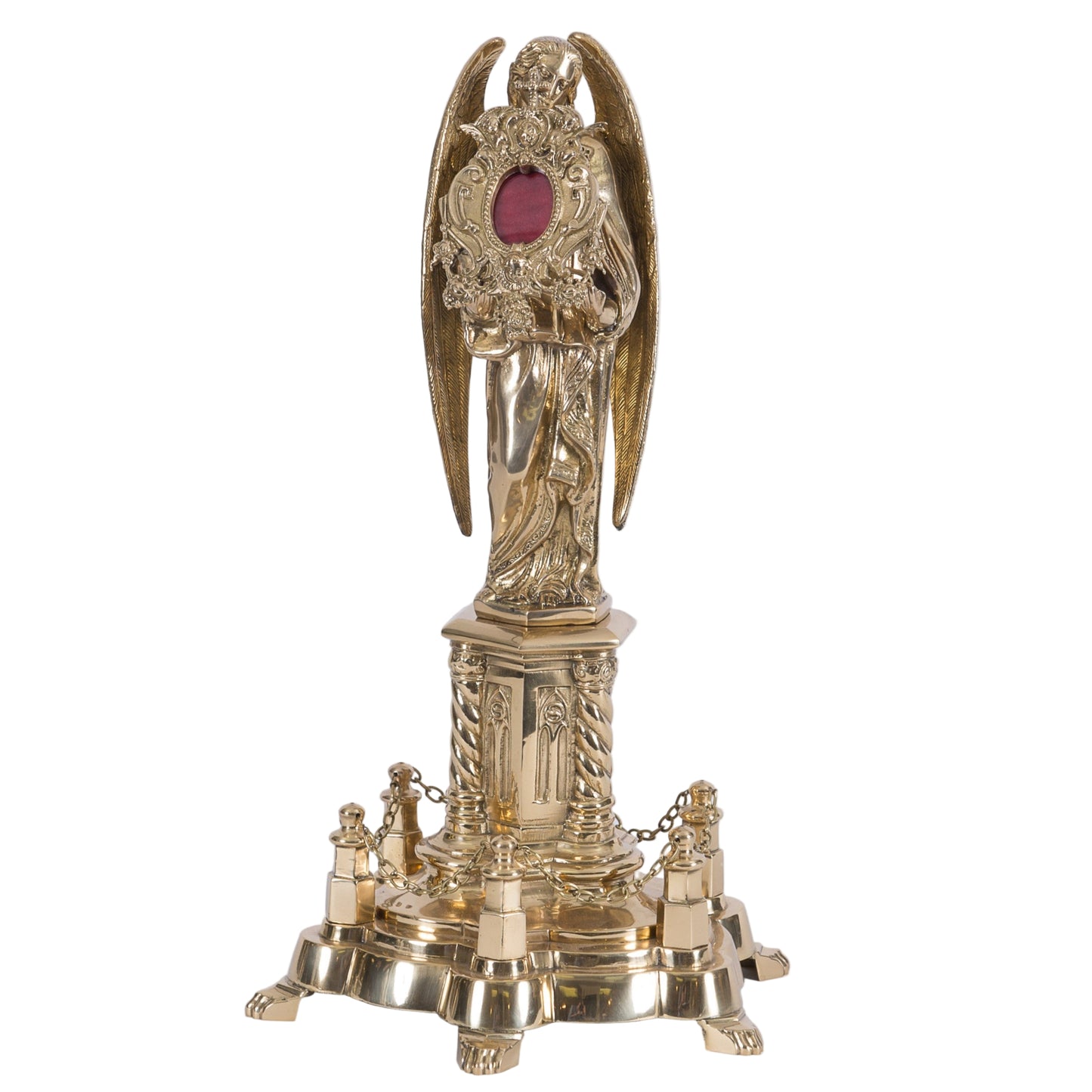 Extra Large Gothic Reliquary. All polished brass and lacquered. Large standing figure of an angel holding a smaller reliquary for your relic.
The smaller reliquary removes from the Angels hands and has a back door that opens and closes. Glass on the front to display your relic.