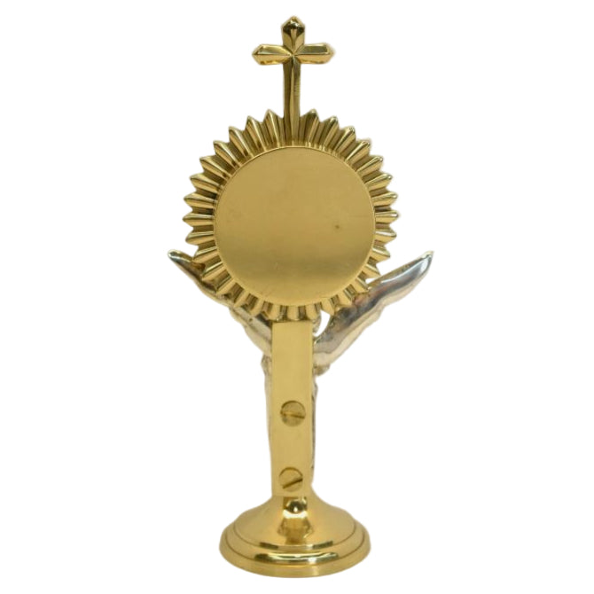 Brass Rays reliquary with a beautiful Silver plated standing Angel figure as the stem. Glass on front and removable back door to house your relic. Back view