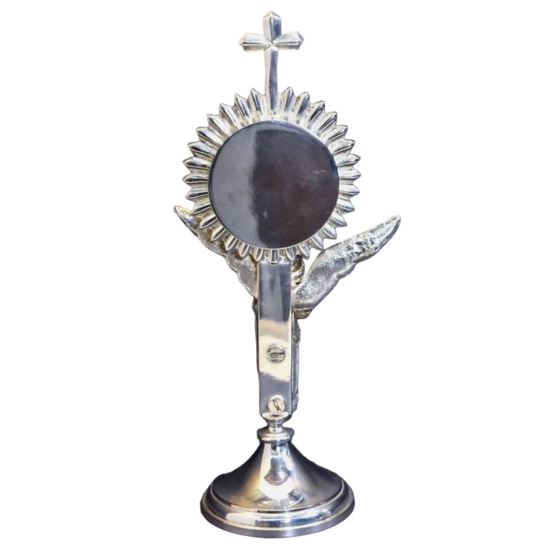 silver plated Rays reliquary with a standing angel figure as the stem. Glass on the front and removable back to display your relic. Back view showing door.