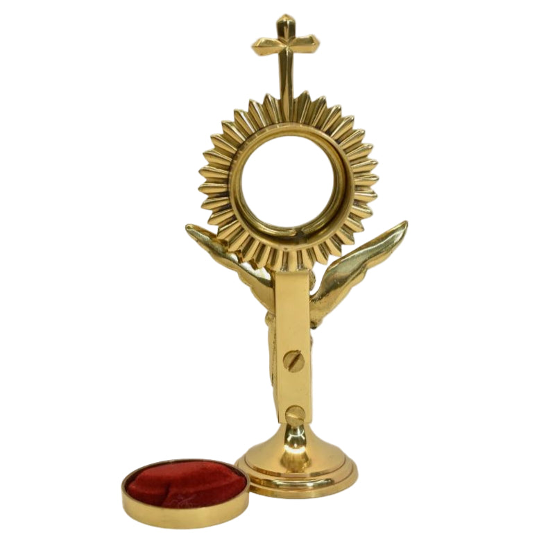 Polished brass and lacquered rays reliquary with standing Angel figure as the stem. Glass on front and removable back door. Back view showing removable door.