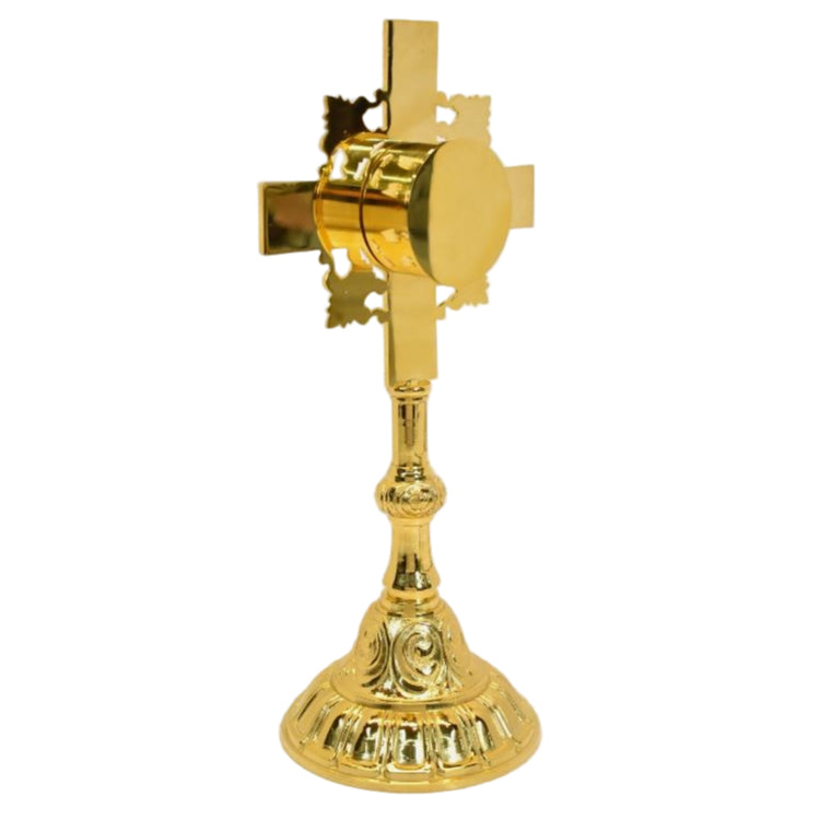 Gold Plated cross shaped reliquary. Glass on the front and removable back door. SIDE VIEW