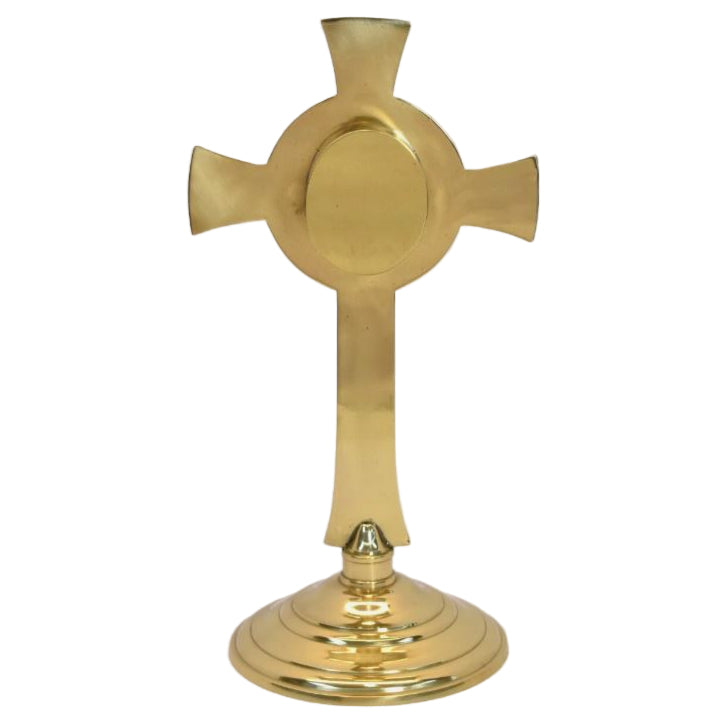 polished brass cross reliquary to display your relic. Showing the back view