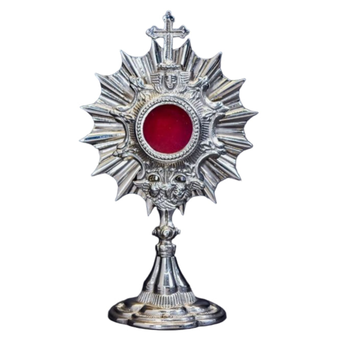 Small silver plated Ray of Life reliquary with small front glass and removable back door. 