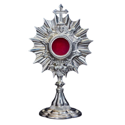 Small silver plated Ray of Life reliquary with small front glass and removable back door. 