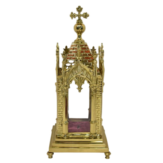 A polished brass relic shrine with glass on all four sides. Removable top to display your relics.