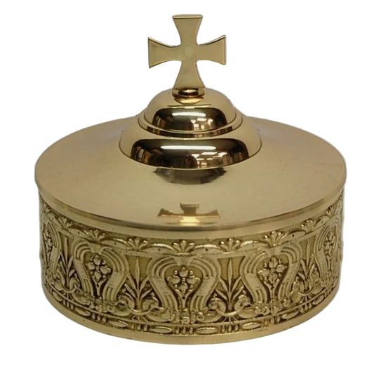 ornate brass host box, pyx, with compressor