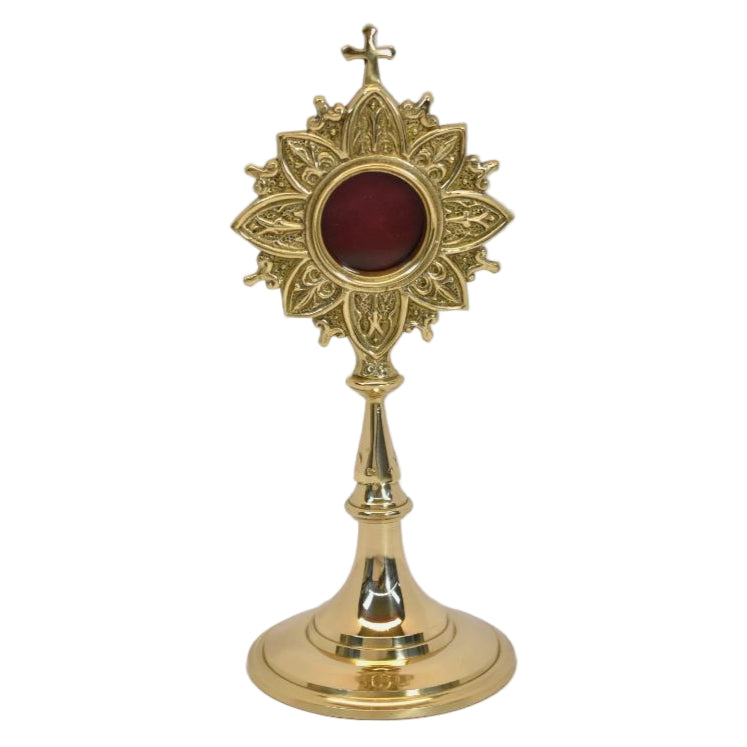 Polished brass and lacquered ornate French style reliquary with a handle on the back for veneration. Glass on front and removable back door to house your relic. FRONT VIEW