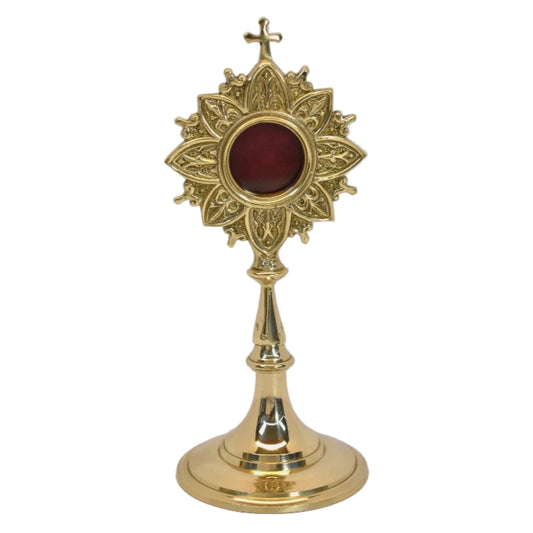 Polished brass and lacquered ornate French style reliquary with a handle on the back for veneration. Glass on front and removable back door to house your relic. FRONT VIEW