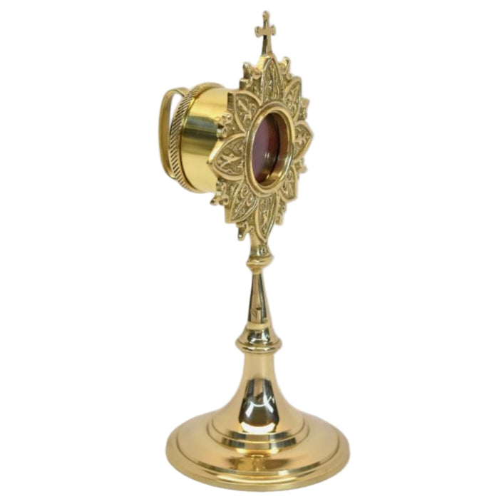 Polished brass and lacquered ornate French style reliquary with a handle on the back for veneration. Glass on front and removable back door to house your relic. SIDE VIEW SHOWING HANDLE