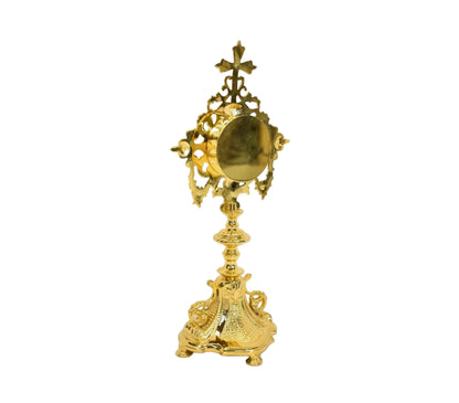 Gold plated french baroque style reliquary with glass on the front and a removable back door to house your relic. 