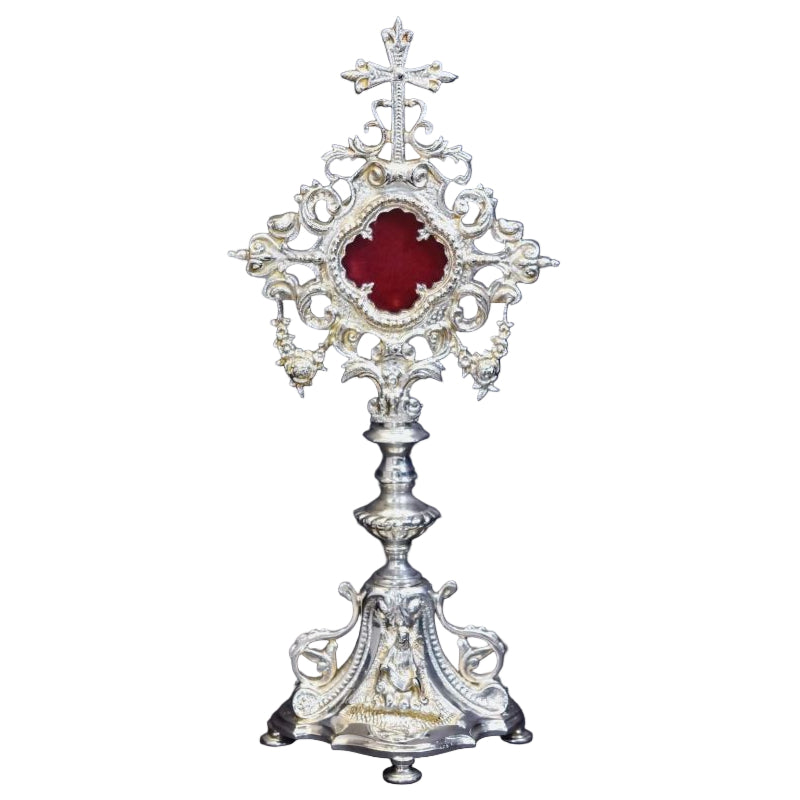 Silver plated french baroque style reliquary. Glass on front and removable glass door to house your relic. 