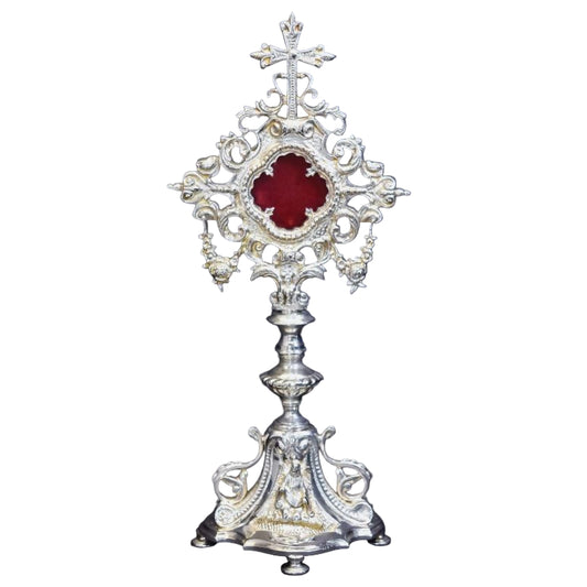 Silver plated french baroque style reliquary. Glass on front and removable glass door to house your relic. 