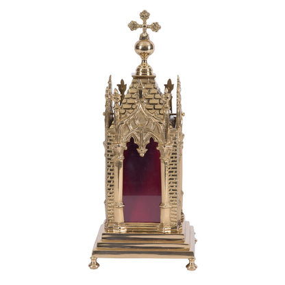A polished brass relic shrine with glass on all four sides. Removable top to display your relics.