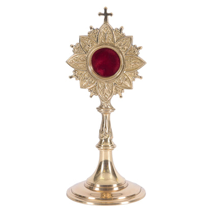  Polished brass and lacquered ornate French style reliquary with a handle on the back for veneration. Glass on front and removable back door to house your relic. FRONT VIEW