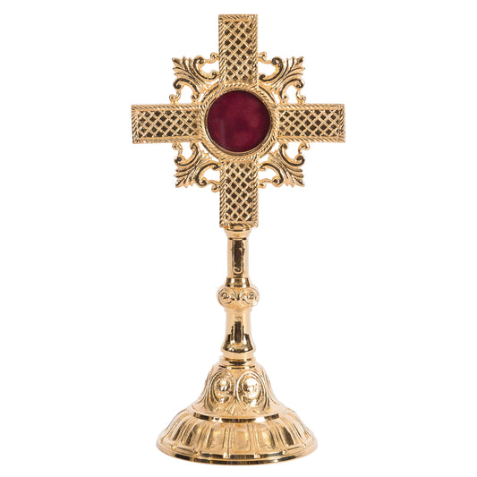 Gold Plated cross shaped reliquary. Glass on the front and removable back door. FRONT VIEW
