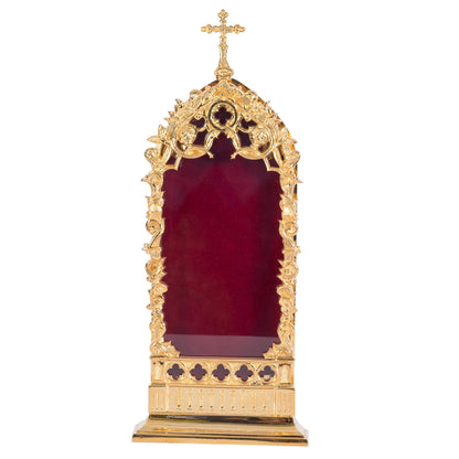 gold plated relic house with a large glass opening on the front and red velvet wall on the back. Door is removable. Can fit multiple relics inside. 
