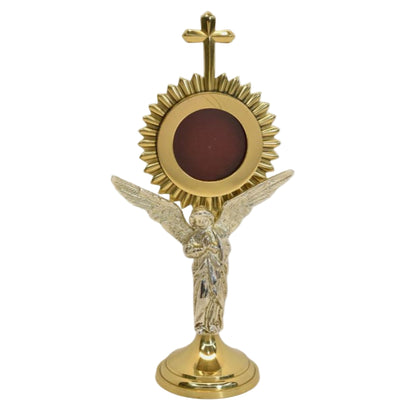 Brass Rays reliquary with a beautiful Silver plated standing Angel figure as the stem. Glass on front and removable back door to house your relic.