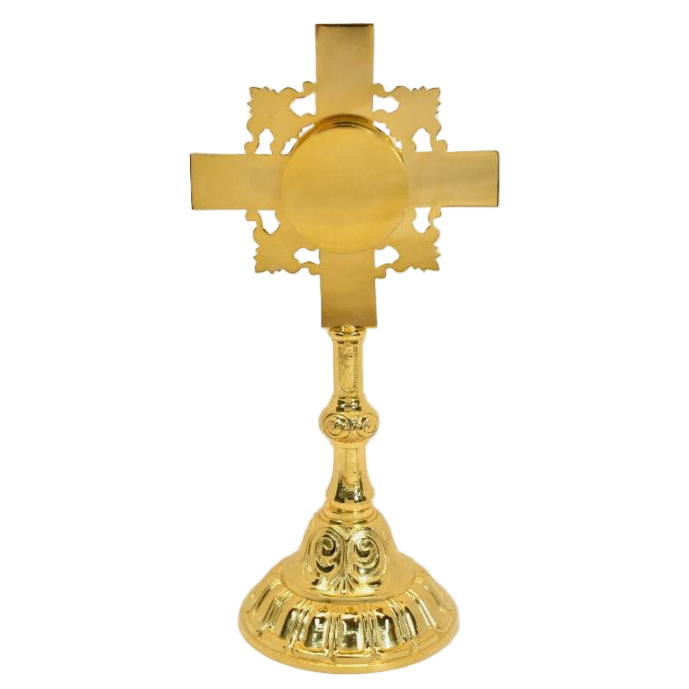 Gold Plated cross shaped reliquary. Glass on the front and removable back door. BACK VIEW