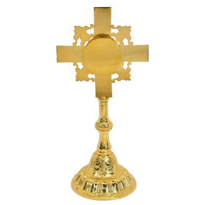 Gold Plated cross shaped reliquary. Glass on the front and removable back door. BACK VIEW